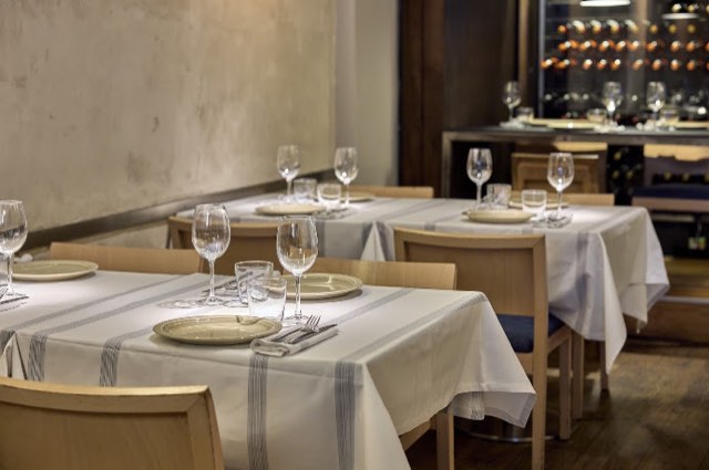 Dining room at Las Tortillas de Gabino with striped tablecloths