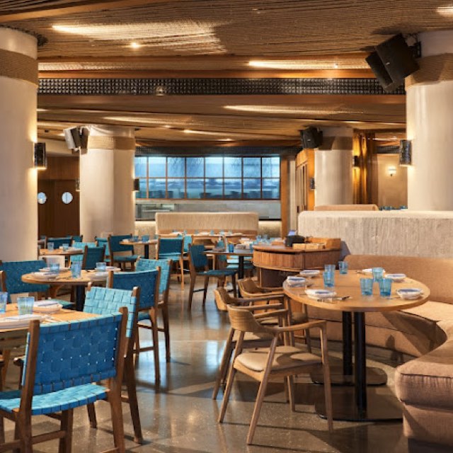 La Mar dining room with blue chairs