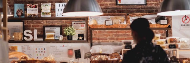 Sana Locura bakery counter with bread baskets