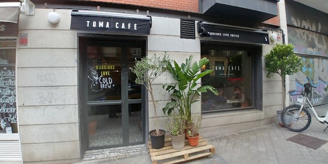Toma Café storefront on Calle Santa Feliciana